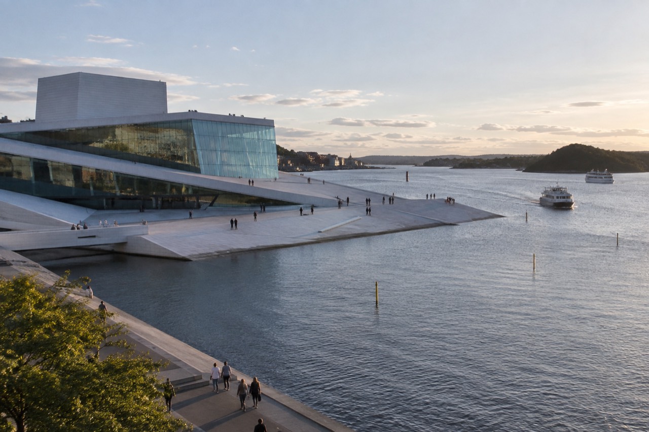 Oslo waterfront with the Opera House and fjord boats in soft evening light