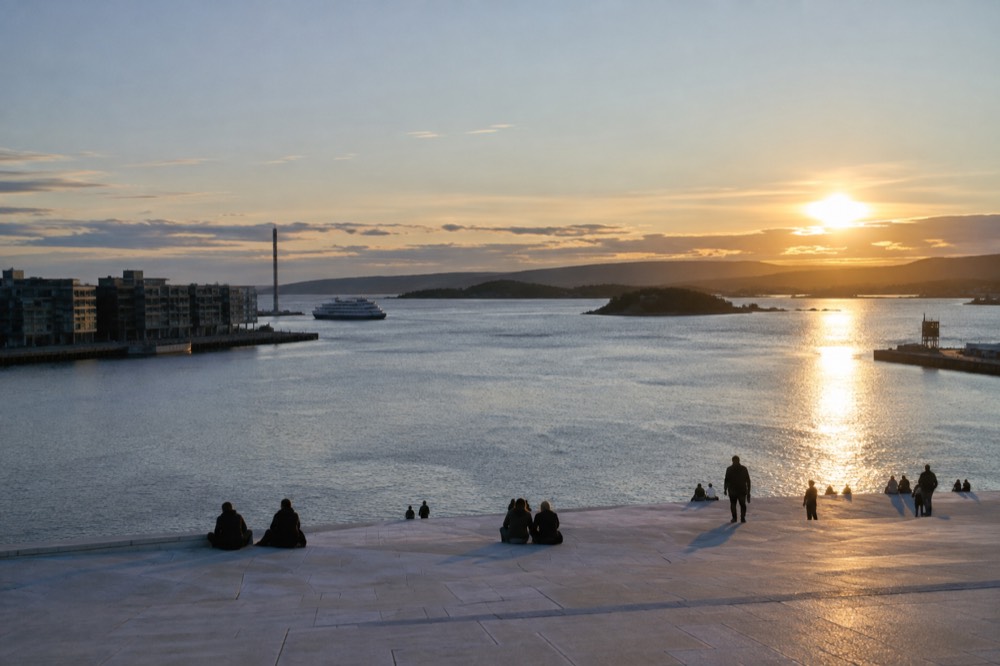 View across the Oslofjord from the top of the Opera House roof at golden hour