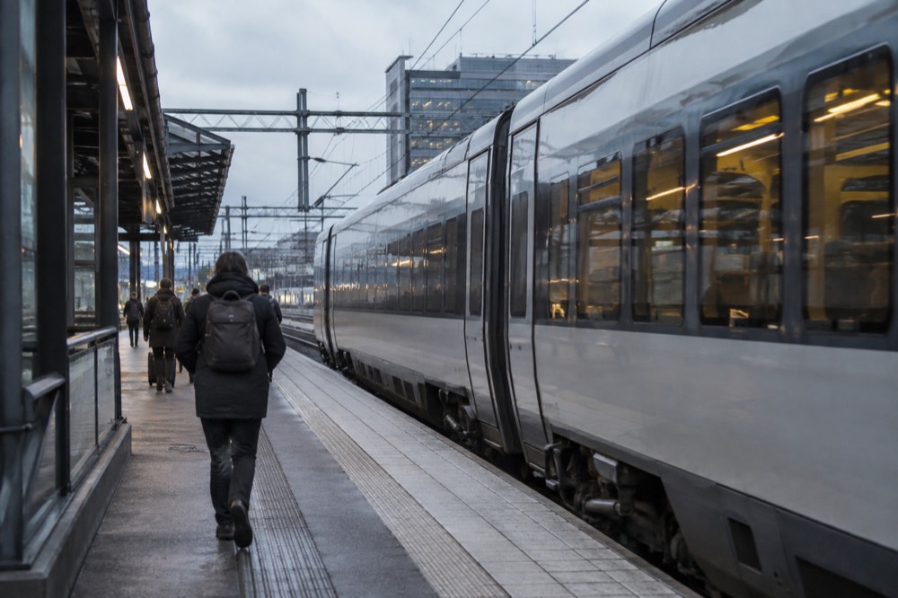 A regional train platform in Gothenburg with a waiting passenger train