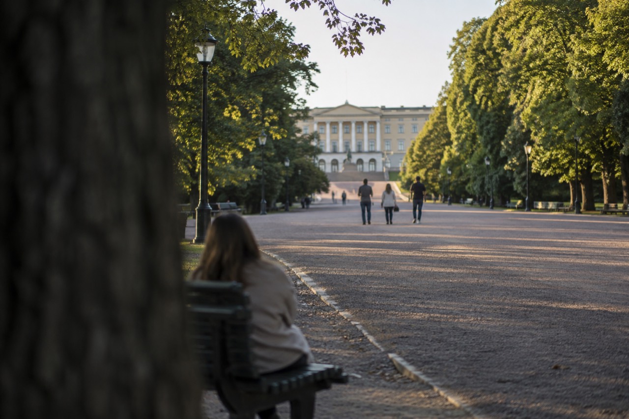 Empty tree-lined avenue with the Royal Palace at the far end