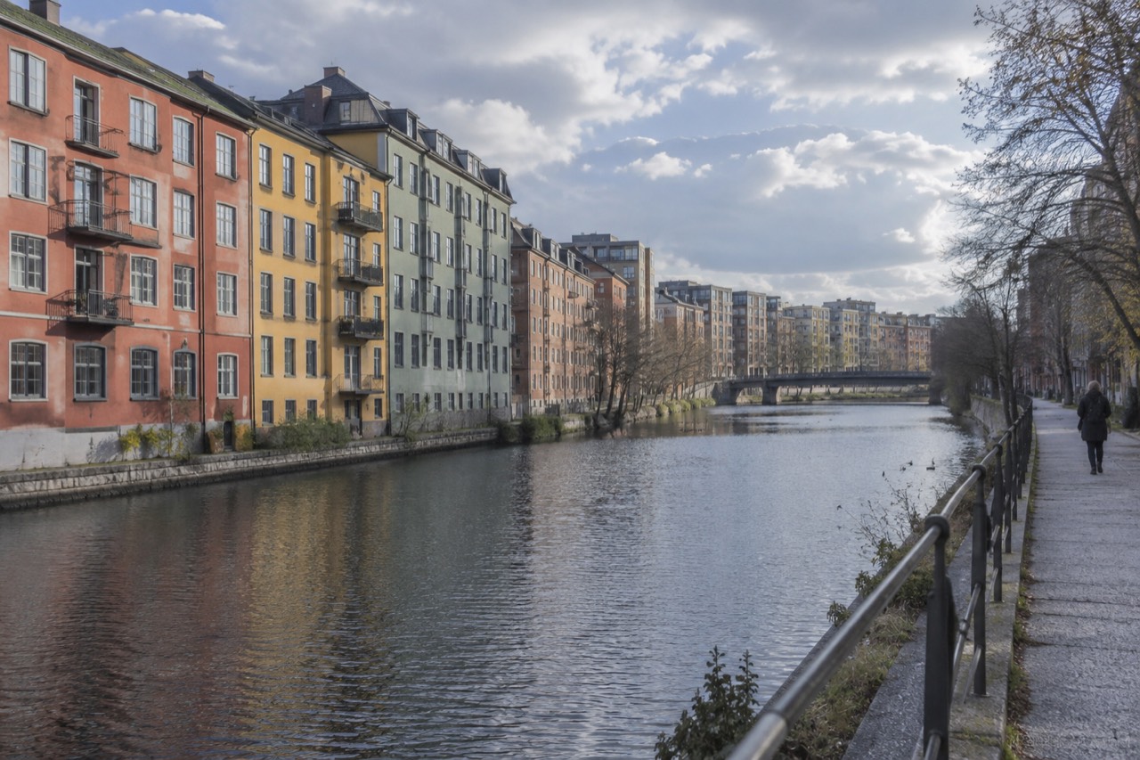 Colorful old warehouse buildings along a canal in the Grünerløkka district of Oslo