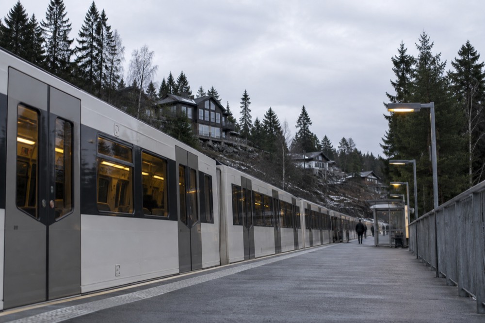 A Oslo metro train at a platform on the Holmenkollen line