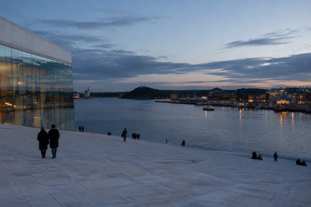 The Oslo Opera House sloping marble roof rising from the Bjørvika waterfront