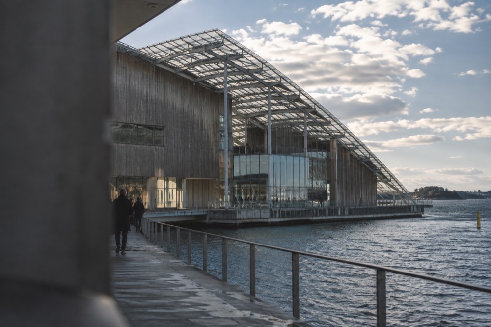 Glass-roofed art museum building at the water's edge at Tjuvholmen