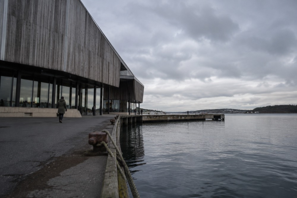 The pointed bow of a polar ship rising inside the museum hall at Bygdøynes