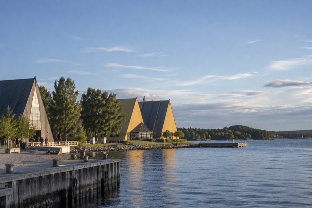 The yellow facade of the Kon-Tiki Museum beside the Fram Museum at Bygdøynes