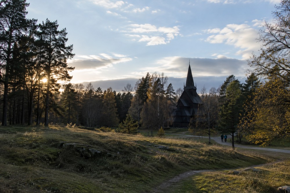 Stave church silhouette against an evening sky on Bygdøy