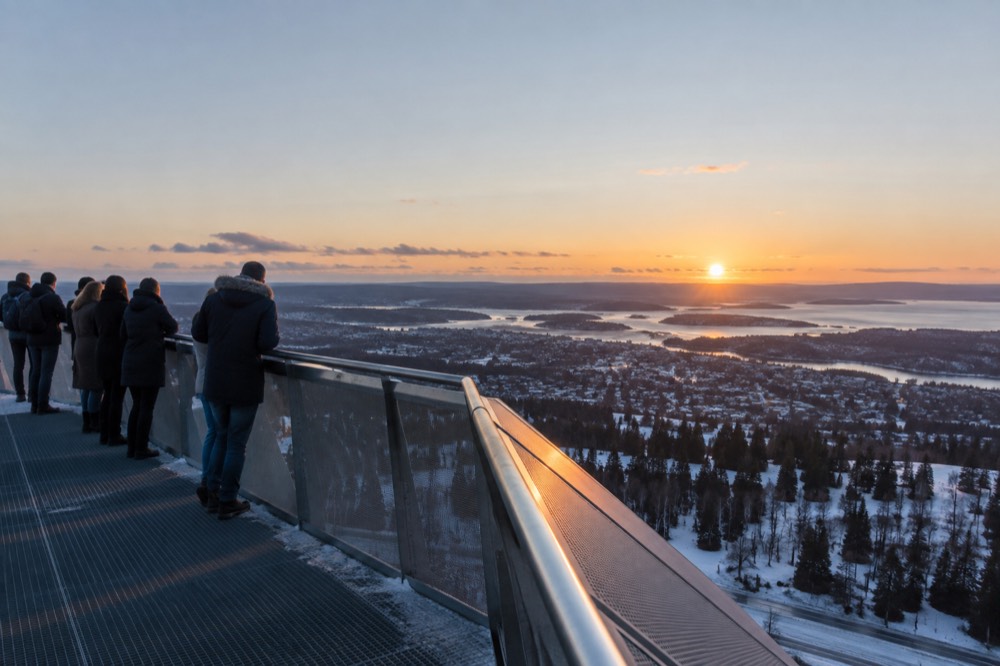 The observation deck at the top of the Holmenkollen jump tower overlooking Oslo and the fjord