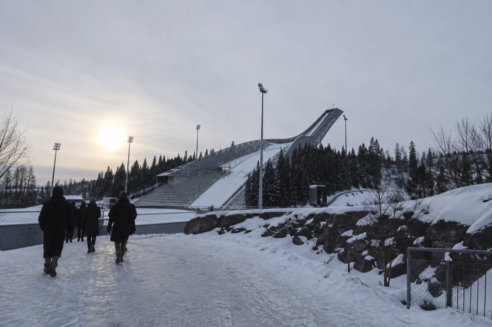 The walkway at the base of the Holmenkollen ski jump with the inrun rising above