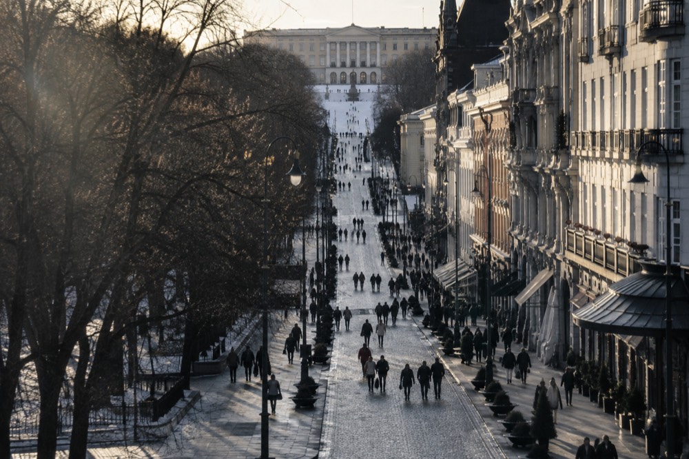 Karl Johans gate in Oslo stretching from the theatre square toward the Royal Palace at the top of the avenue