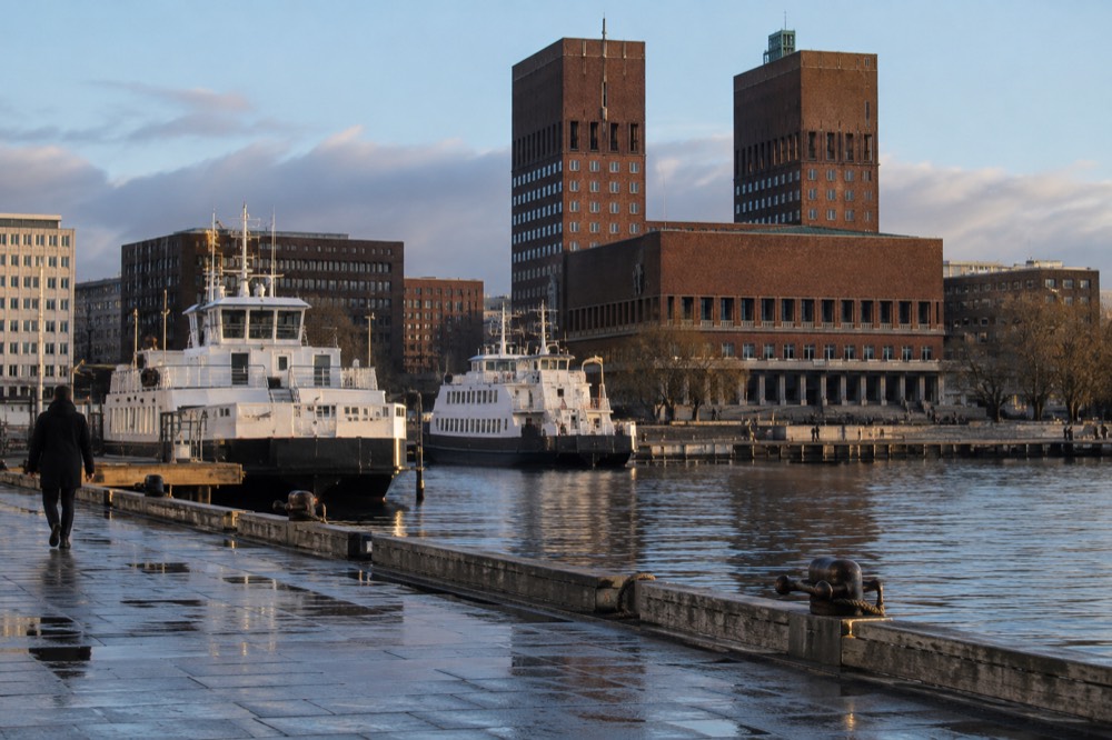 Ferry boats at the City Hall pier with the museum building behind