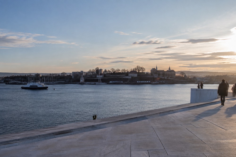 View from the top of the Opera House roof across the Oslofjord toward Akershus Fortress