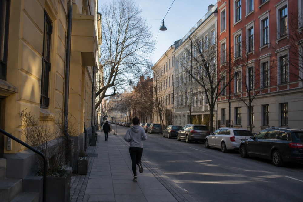 Colorful brick apartment buildings along a quiet street in Grünerløkka