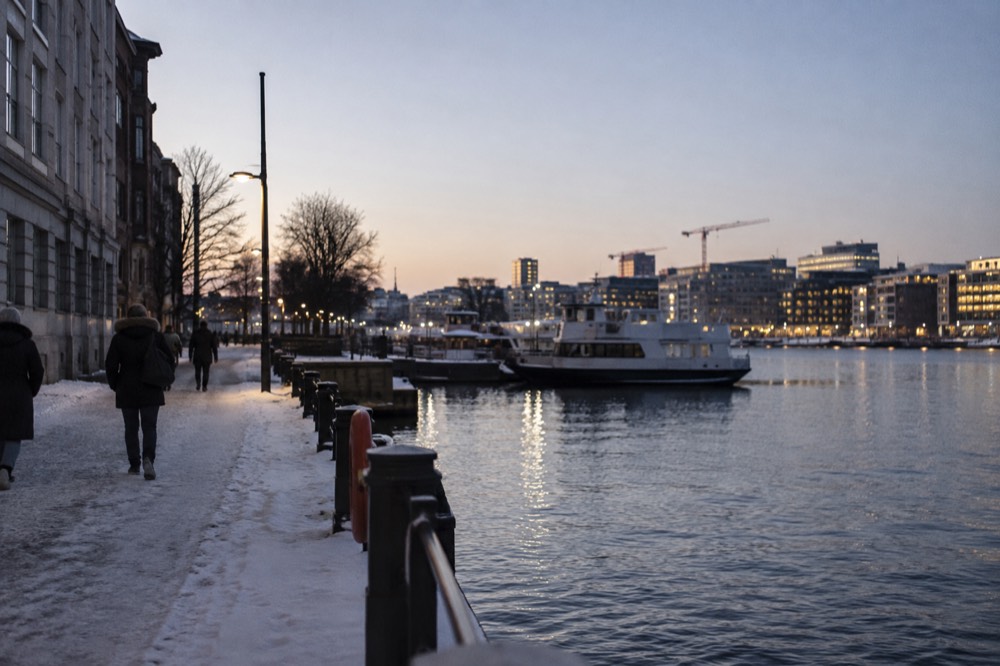 City lights along the Oslofjord waterfront on a dark winter evening