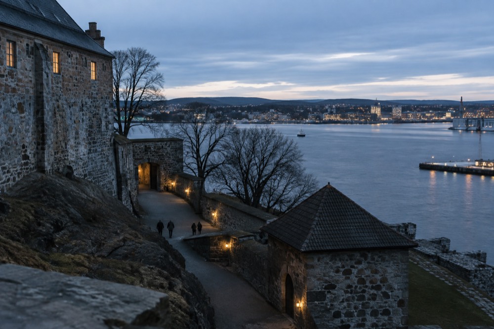 Akershus Fortress stone walls overlooking the Oslofjord harbor