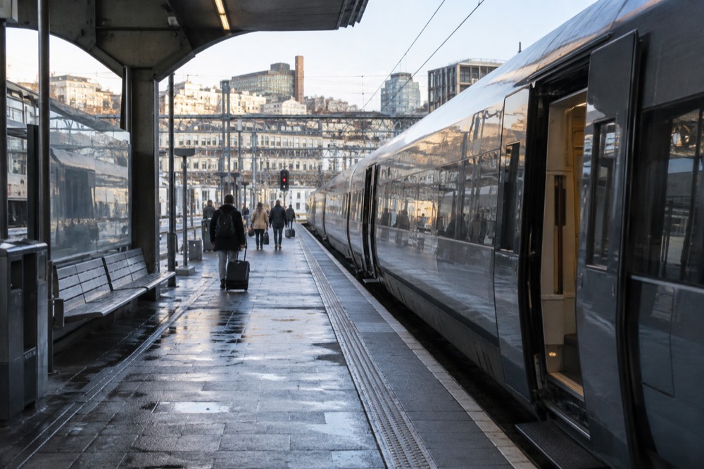 Intercity train waiting at a Norwegian station platform