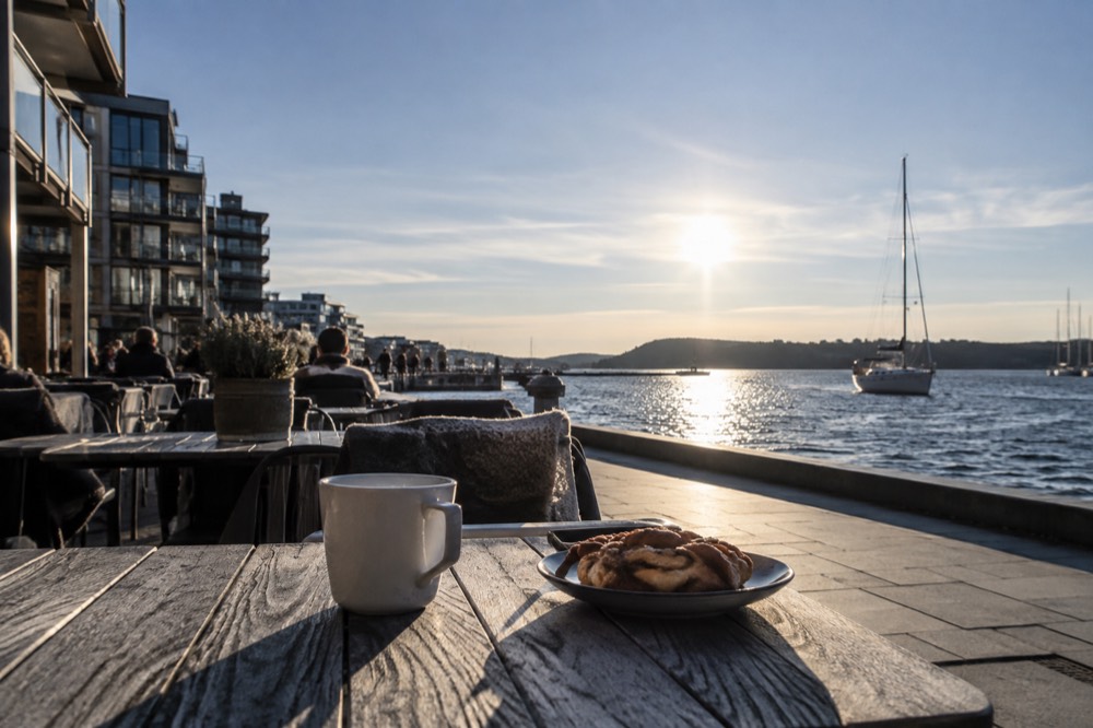 Aker Brygge waterfront with outdoor tables along the fjord