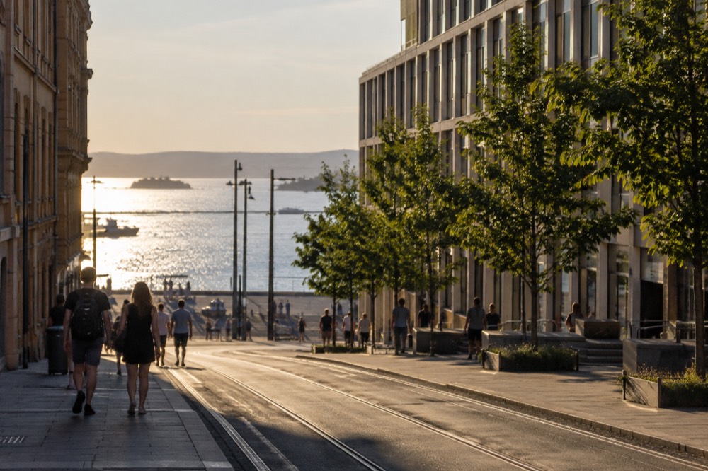 Sun low over the Oslofjord between islands on a long summer evening