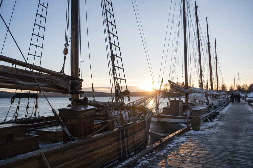 Wooden sailing ships moored at Bygdøy peninsula pier