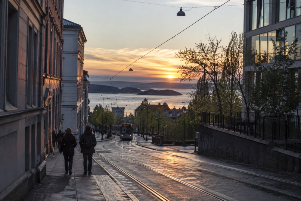 Evening light over the Oslofjord with small islands silhouetted against the water