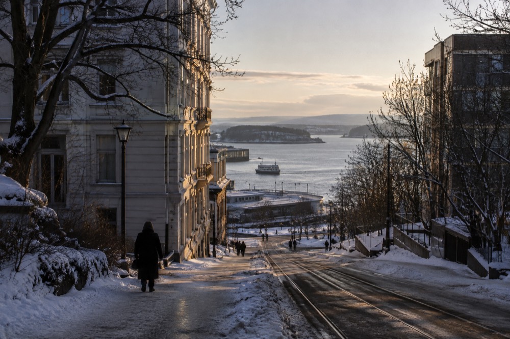 Oslo fjord at midday twilight with low blue light over the water and islands
