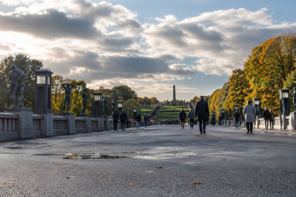 Sculptures along the bridge in Vigeland Park in soft afternoon light