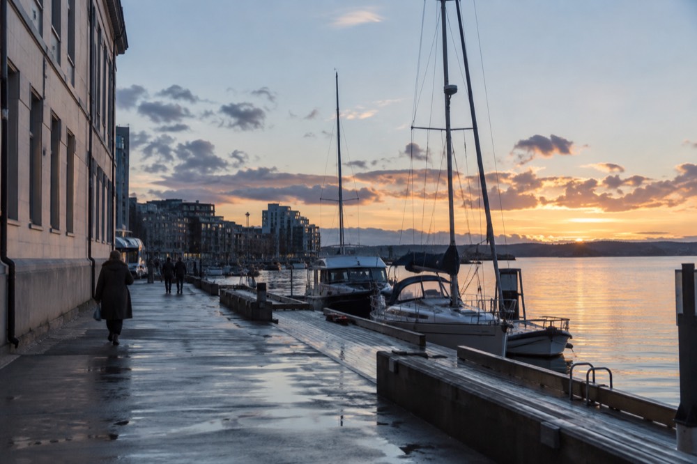 Evening light over the Oslofjord piers with moored boats