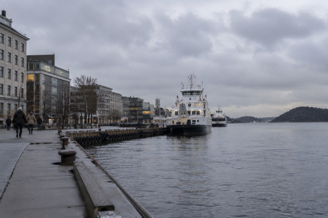 Harbor front in central Oslo with ferries moored at the piers
